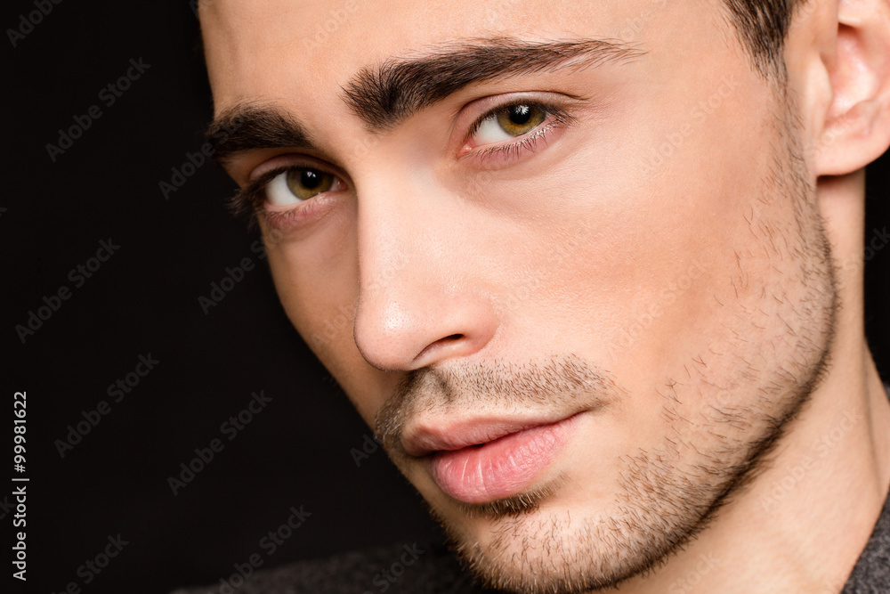 Obraz premium Model man's face close-up