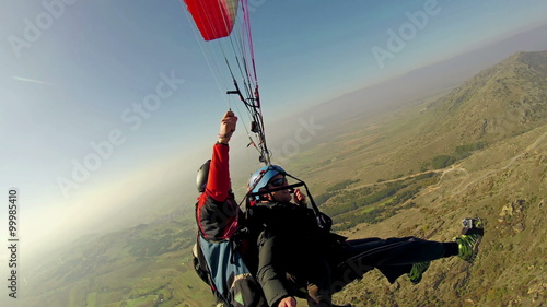 Wallpaper Mural Parachute sliding with two people passing  Torontodigital.ca