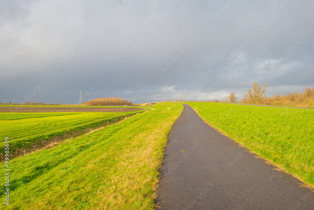 Road in the sunlight of deteriorating weather Road in the sunlight of deteriorating weather