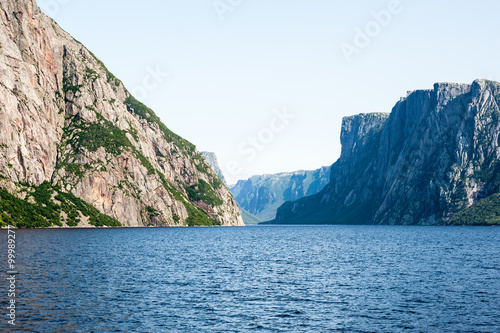 Inland fjord between rugged steep cliffs © ArchonCodex