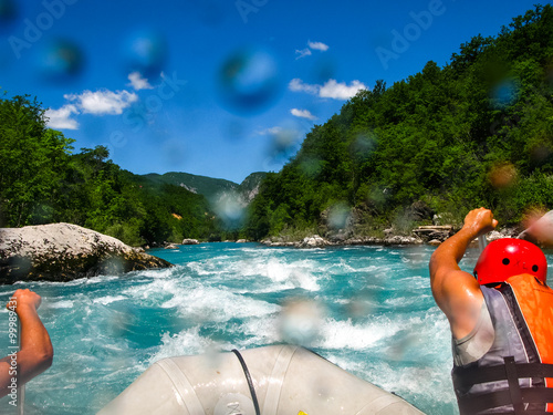 rafting boat on the fast mountain river