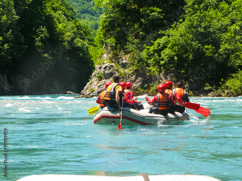 rafting boat on the fast mountain river