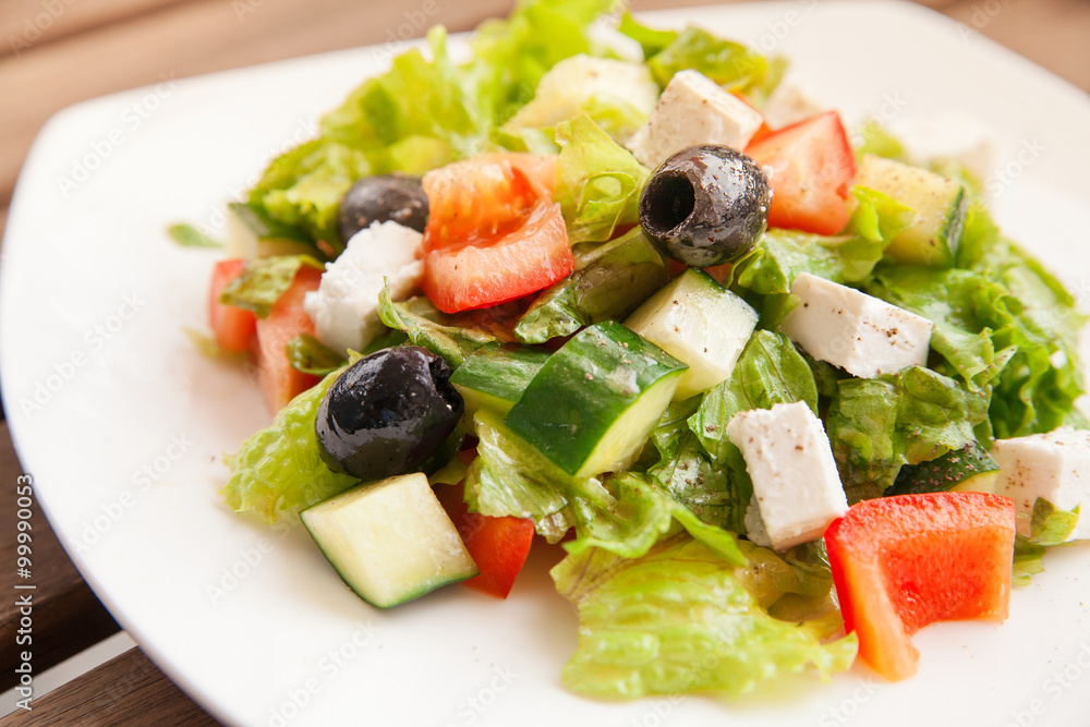 Caesar salad on a white plate Caesar salad on a white plate