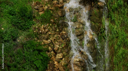 Royalty Free Stock Video Footage of side and bottom of waterfall shot in Israel at 4k with Red. photo