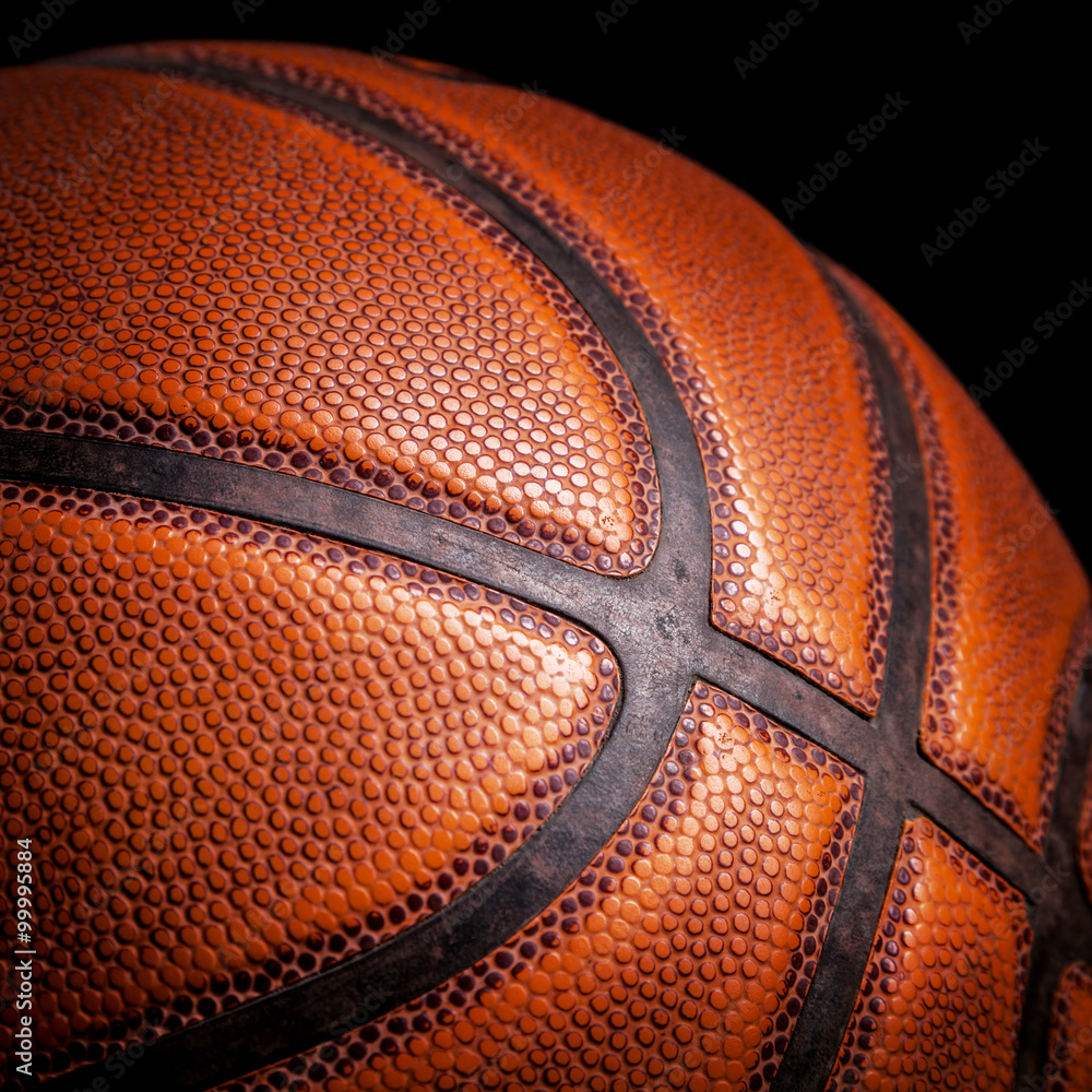 Fototapeta premium basketball ball on a black background