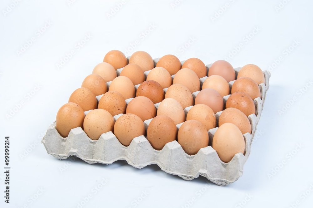 Egg in an egg crate on white background Egg in an egg crate on white background