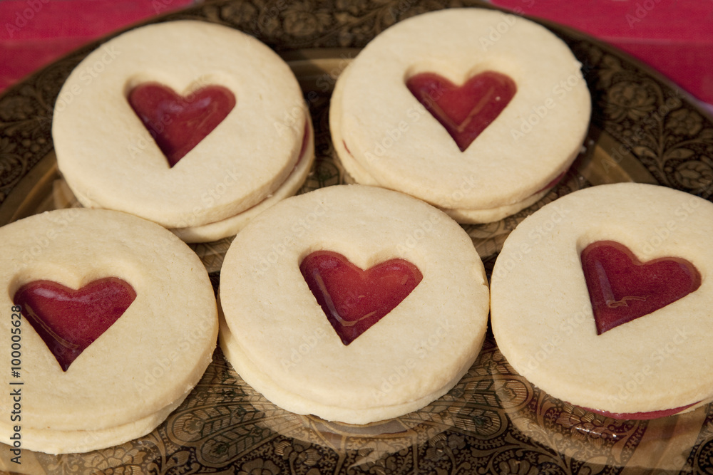 Heart shaped Biscuits on Red Background