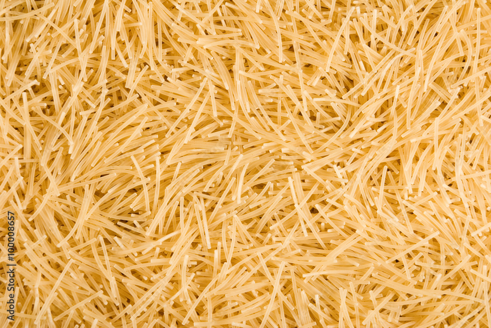 image of many raw pasta close-up