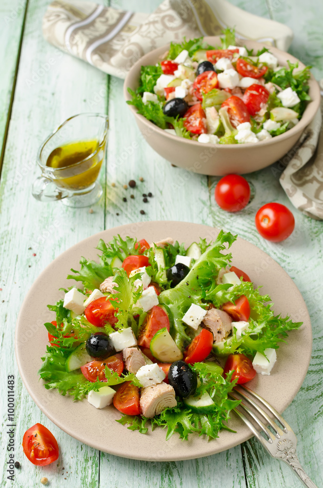 Fresh salad with tuna, tomatoes and cucumbers Fresh salad with tuna, tomatoes and cucumbers