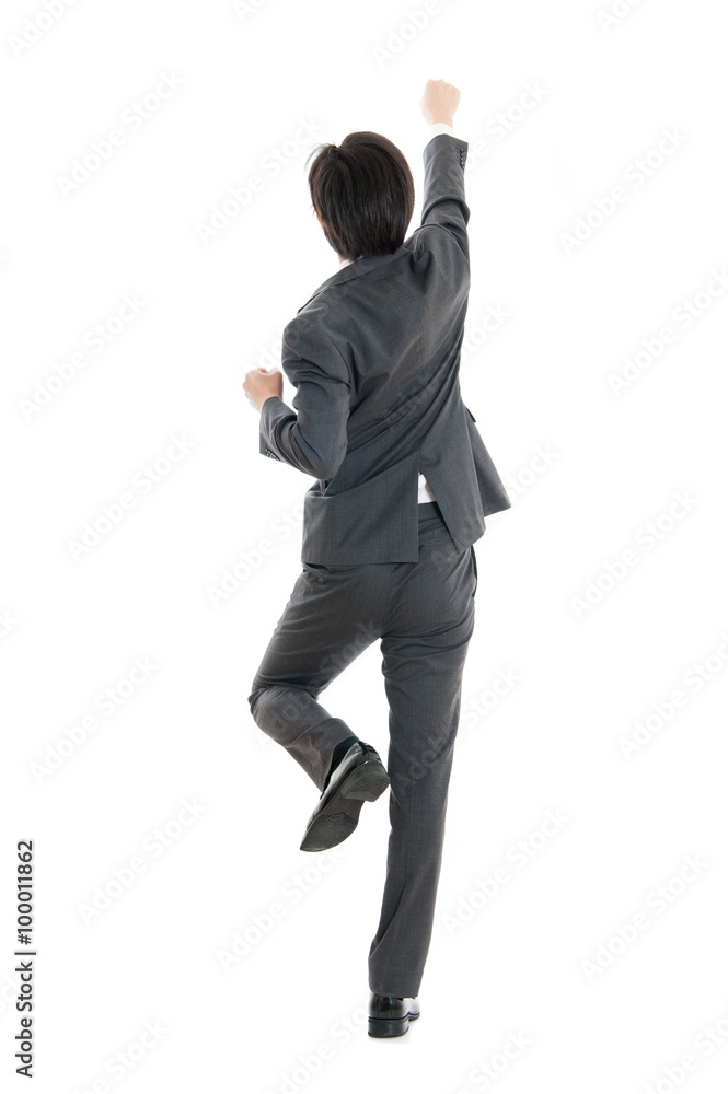 ジャンプするビジネスマンの後ろ姿 素材 Stock 写真 Adobe Stock