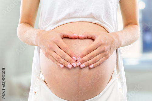 Wallpaper Mural Portrait of the young happy smiling pregnant woman Torontodigital.ca