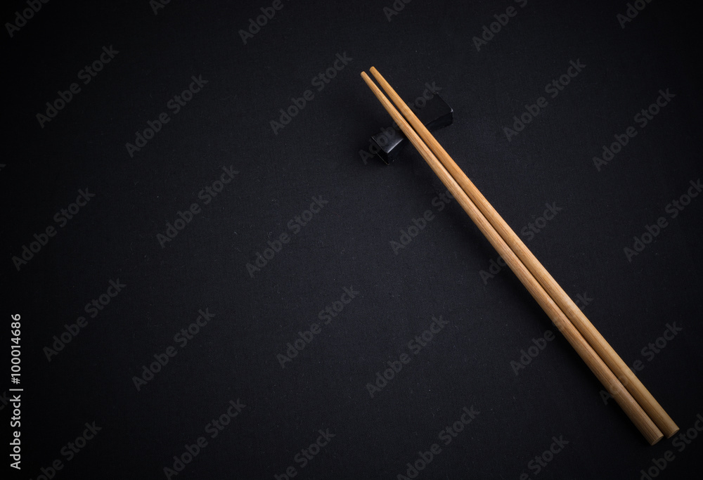 Chopsticks on black background Chopsticks on black background