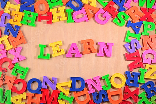 Learn written by plastic colorful letters