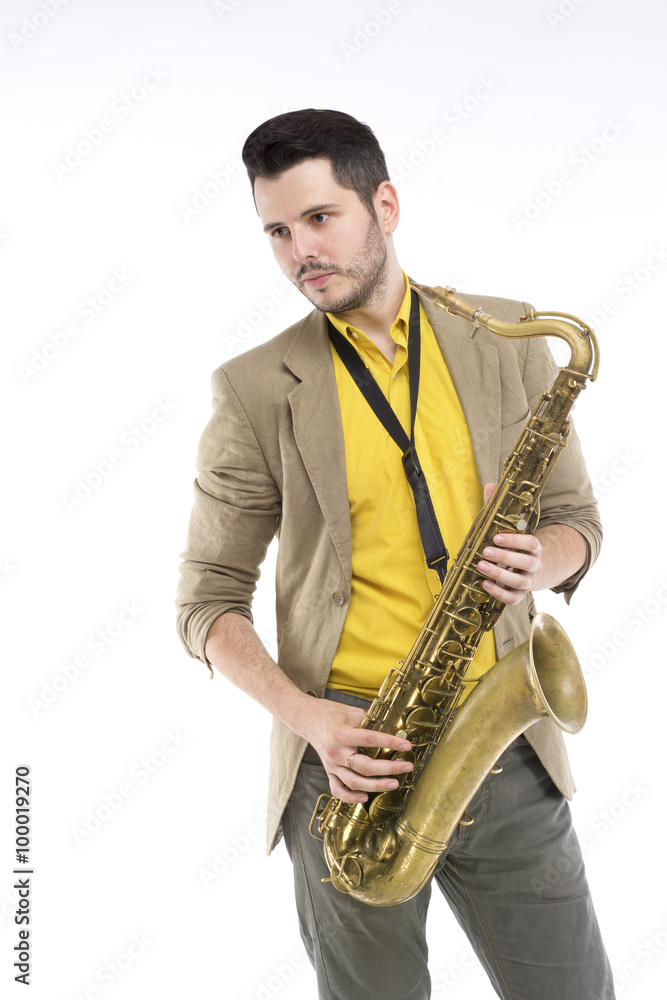 Fototapeta premium A saxophone player white background. Saxophonist jazz man with