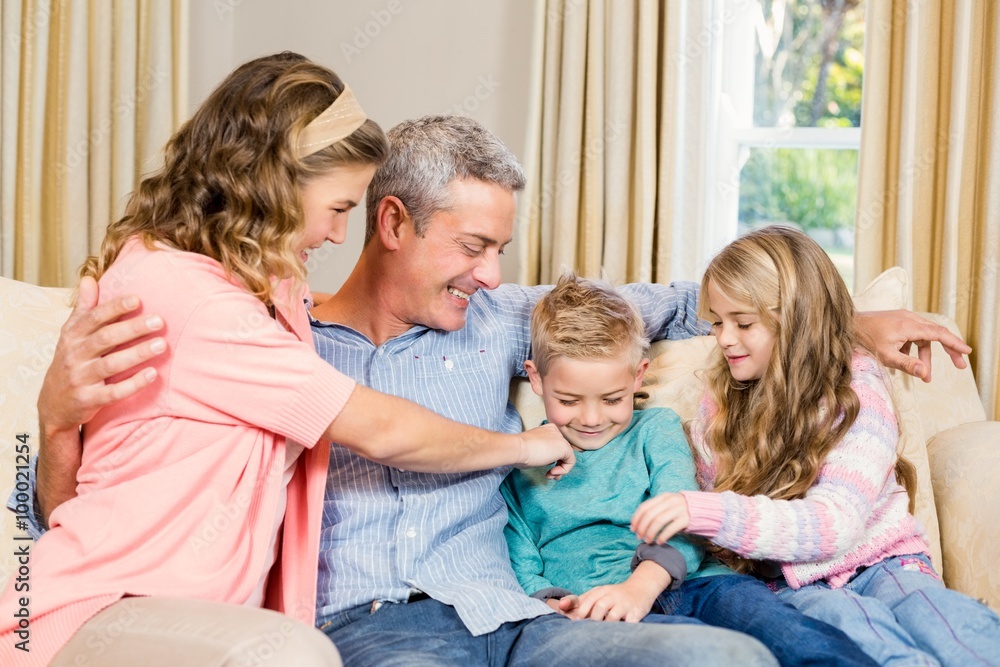 Happy family on the sofa Happy family on the sofa