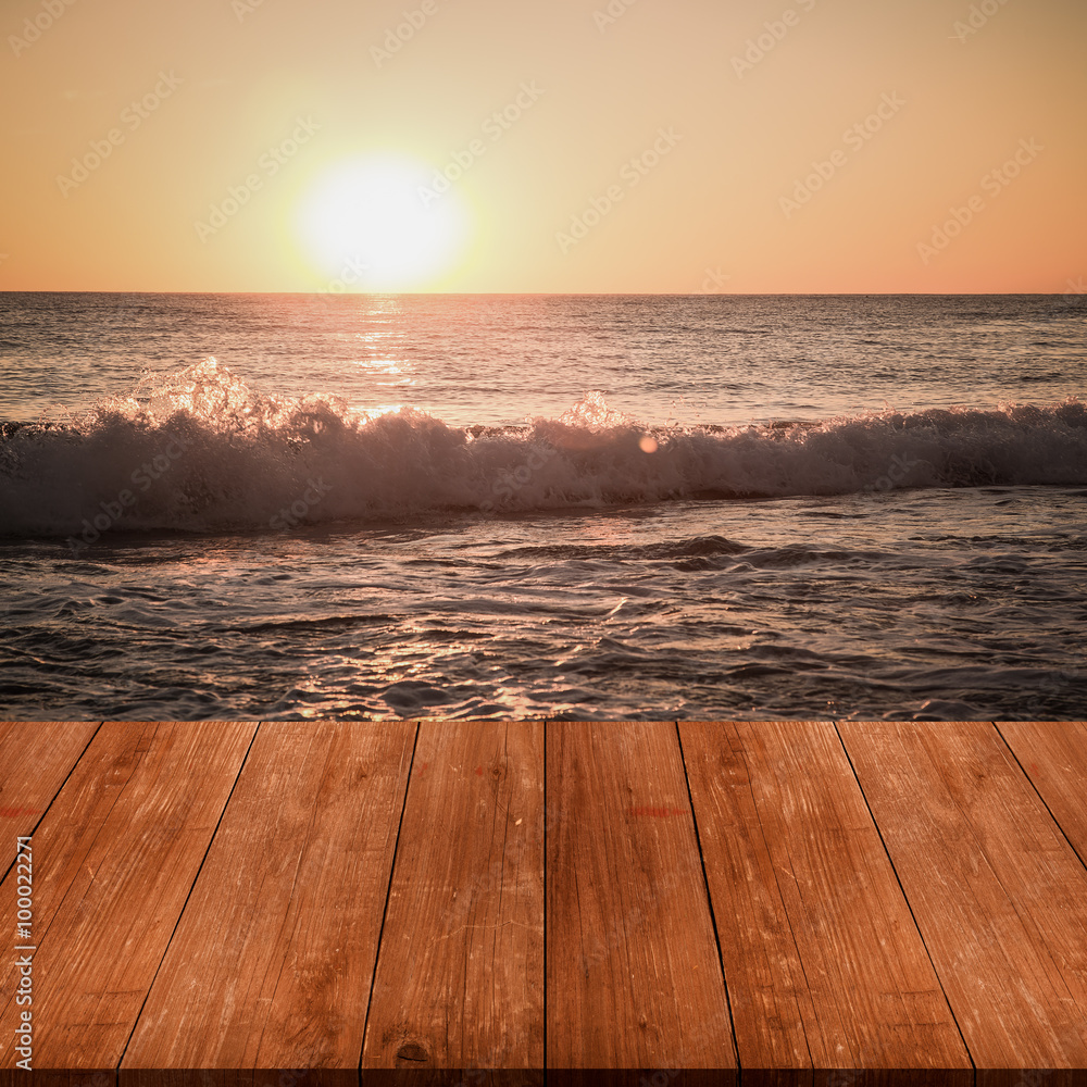 View on beautiful sunset over Mediterranean sea from dark wooden