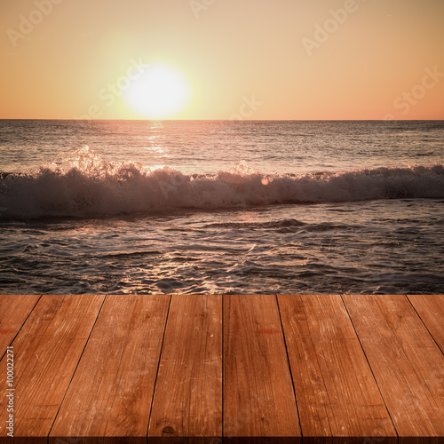 View on beautiful sunset over Mediterranean sea from dark wooden © strannik_fox