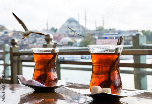 Turkish tea cup on the background of port in Istanbul