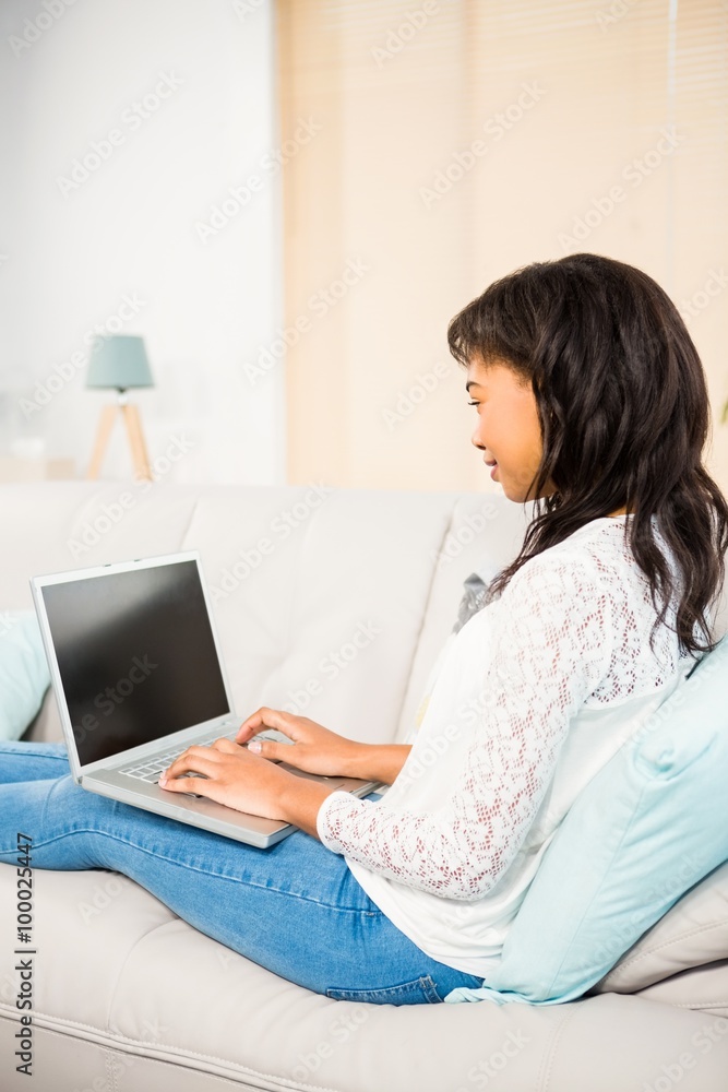 Pretty woman using her laptop