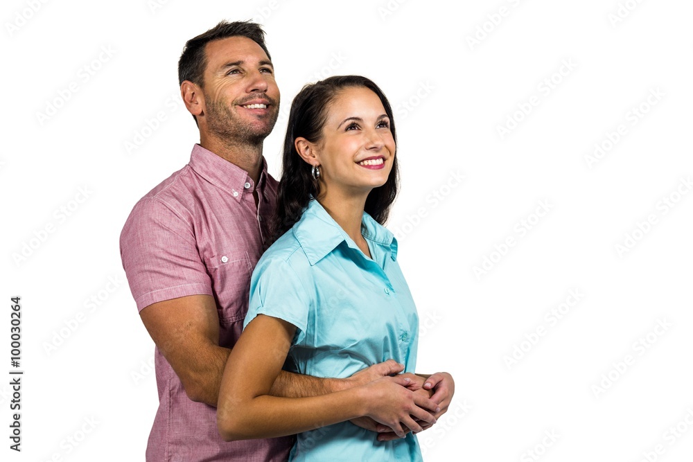 Obraz premium Smiling couple looking up