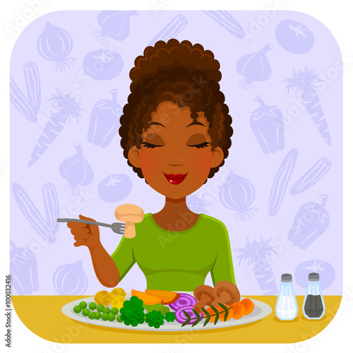 young woman enjoying a healthy plate of vegetables