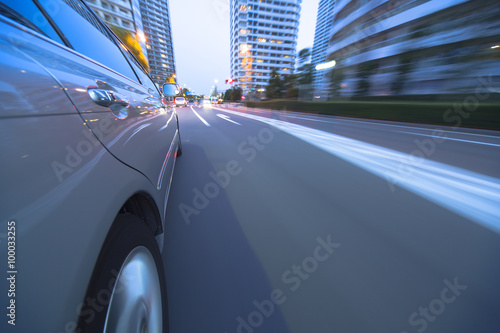 Driving in the sunset city.