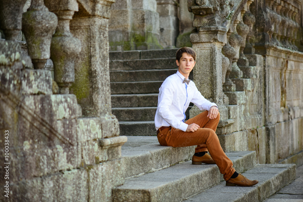 young cute guy sitting on the porch young cute guy sitting on the porch