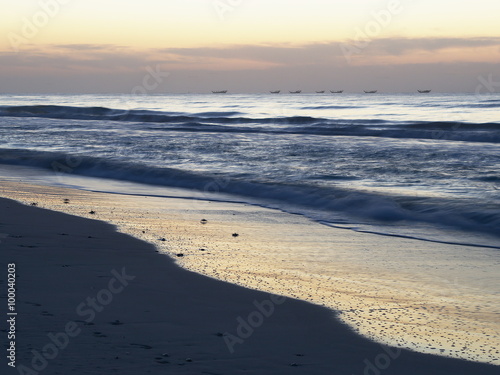 Sunrise at Shuwaymiyah beach © ondrejvavra