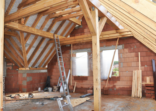 Building Attic Interior. Roofing Construction Indoor.  © bildlove