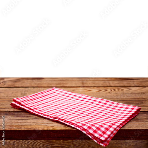 Empty wooden deck table with tablecloth isolated.