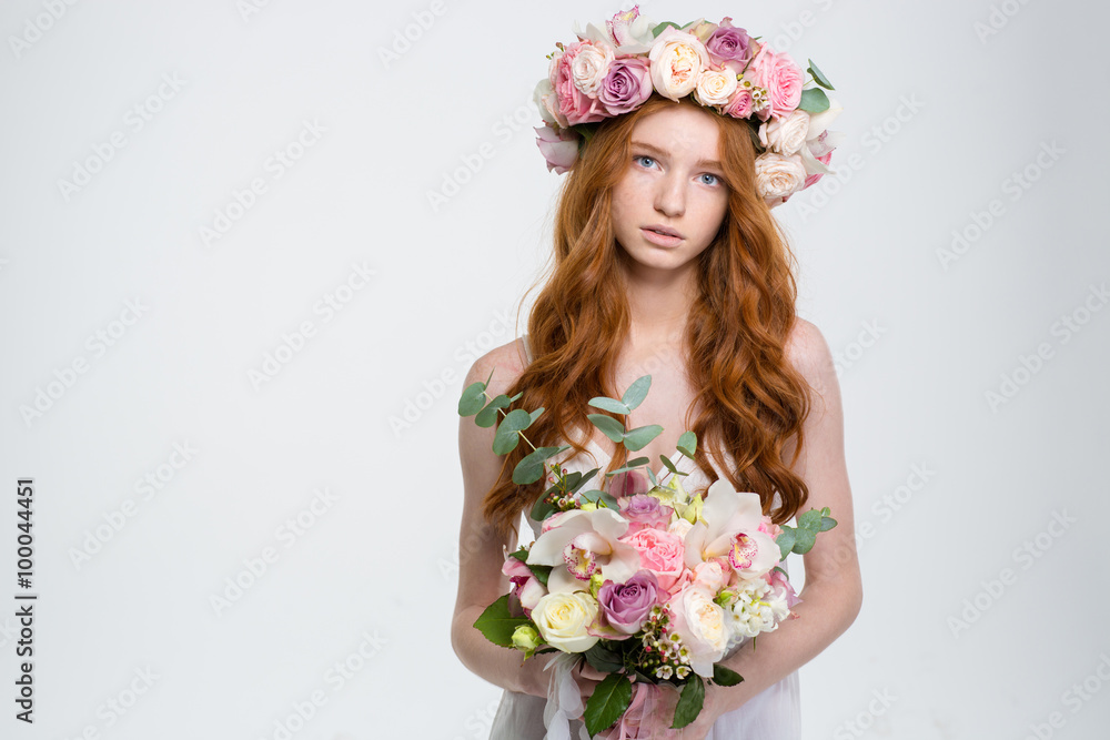 Cute lovely young woman in wreath with bouquet of flowers Cute lovely young woman in wreath with bouquet of flowers
