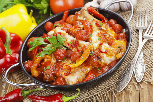 Chicken in a sauce of tomato and pepper