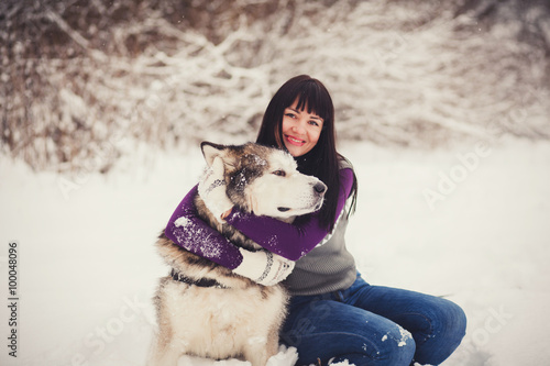 Fototapeta Naklejka Na Ścianę i Meble -  Girl with her cute dog