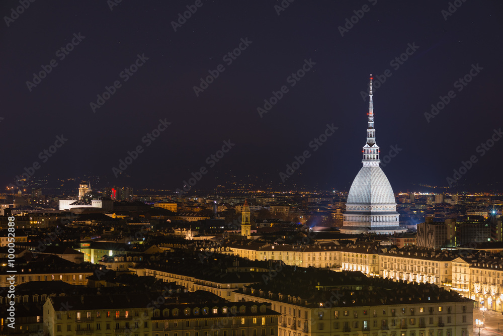 Cityscape of Torino (Turin, Italy) by night with starry sky