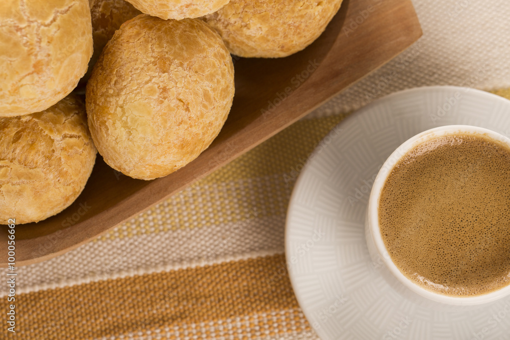 Brazilian cheese buns . Table cafe in the morning with cheese bread. Brazilian cheese buns . Table cafe in the morning with cheese bread.