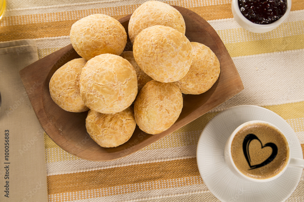 Brazilian cheese buns . Table cafe in the morning with cheese bread. Brazilian cheese buns . Table cafe in the morning with cheese bread.