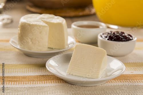 Brazilian sheep cheese. Fruits and different types of cheese in photo