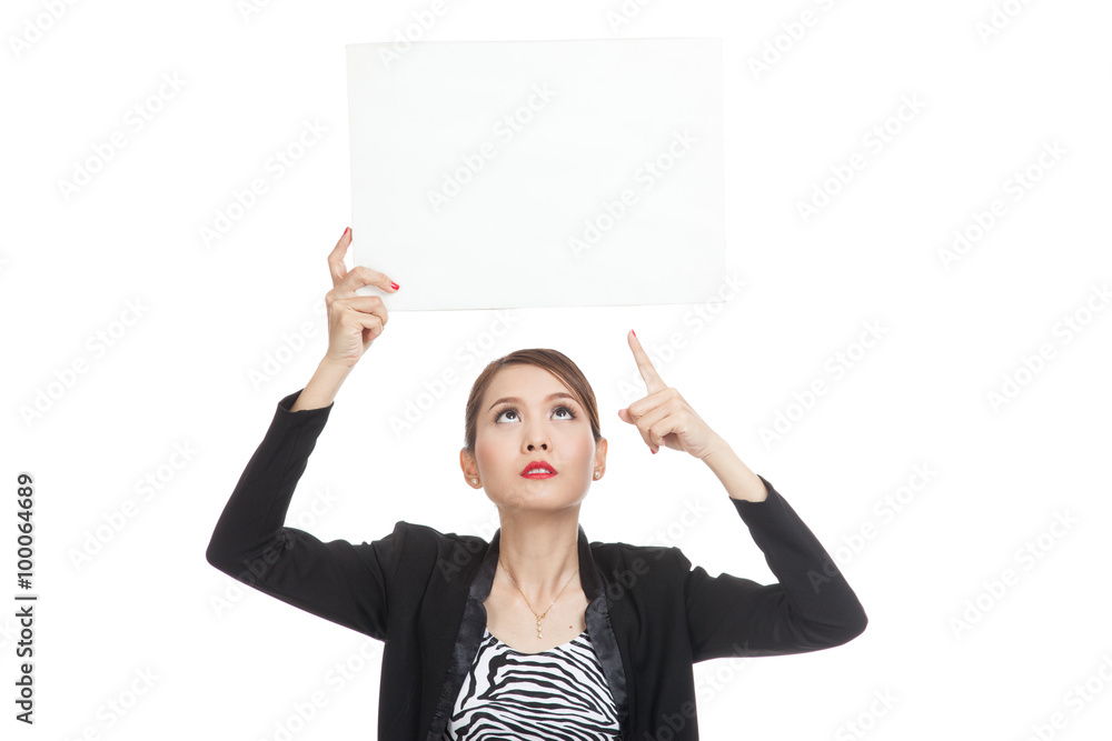 Young Asian business woman point to blank sign Young Asian business woman point to blank sign