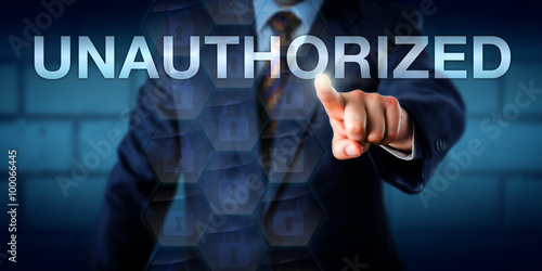 Manager Touching The Word UNAUTHORIZED Onscreen