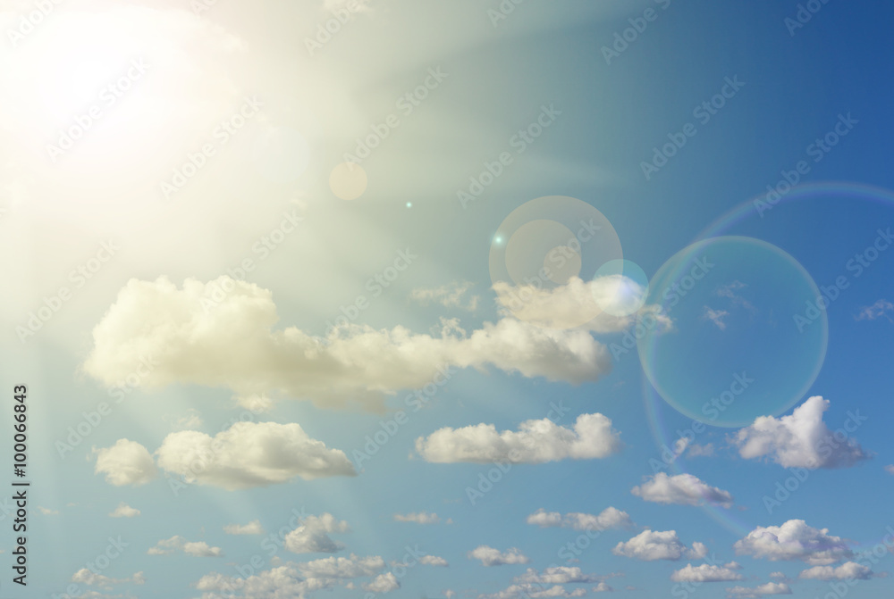 sunlight, lens flare , blue sky and clouds sunlight, lens flare , blue sky and clouds