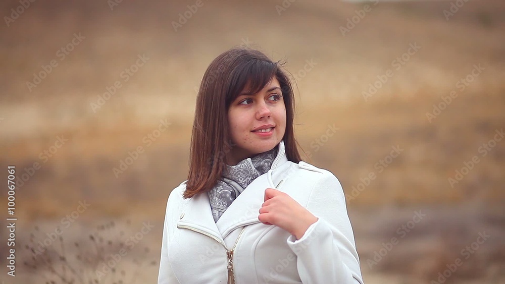 girl woman in autumn nature coat the wind is blowing brown background girl woman in autumn nature coat the wind is blowing brown background