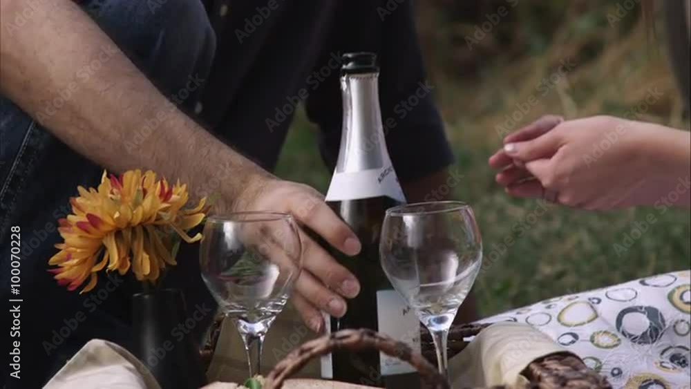 Slow motion of man pouring glasses of wine. Slow motion of man pouring glasses of wine.