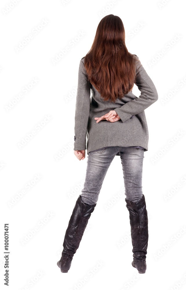 back view of standing young beautiful woman. back view of standing young beautiful woman.