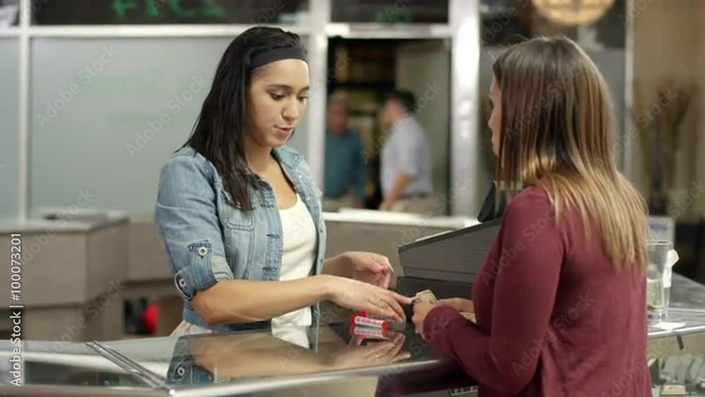 A customer buying product at a recreational marijuana shop A customer buying product at a recreational marijuana shop