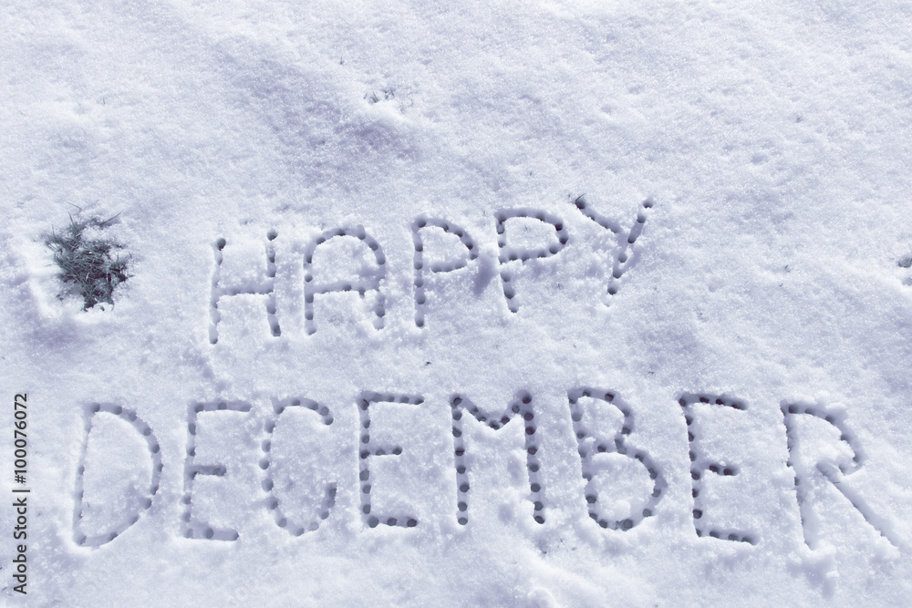 Written words Happy December on a snow field, filter applied Written words Happy December on a snow field, filter applied