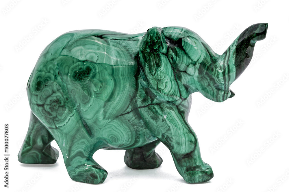 Fototapeta premium Elephant figurine from malachite, isolated on white background,