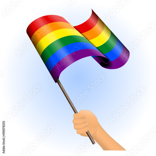Hand holding a rainbow pride flag vector
