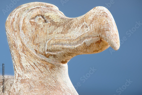Head of the wooden Dodo bird - typical souvenir from Mauritius island. Dodo is an extinct flightless bird that was endemic to the island of Mauritius.