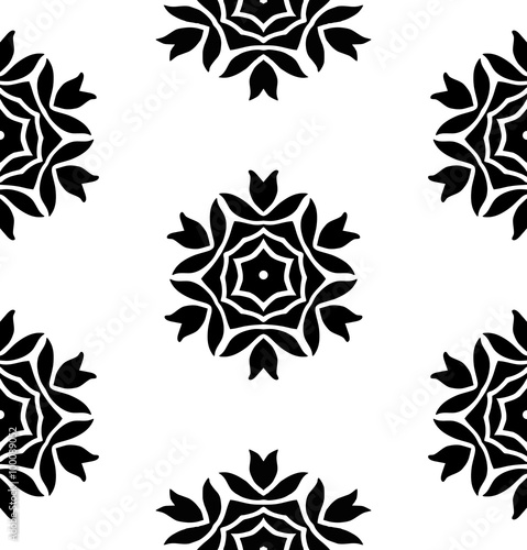 Abstract floral ornament in black on white