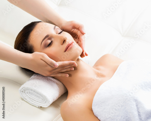 Beautiful woman on a spa massage procedure